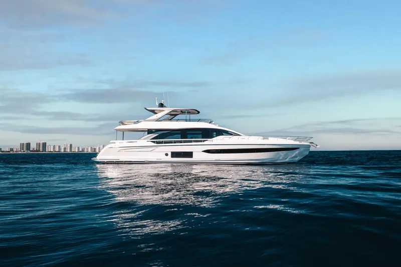 Slide: The Image of 2024 Azimut Fly 78 luxury yacht cruising on open water. - 6