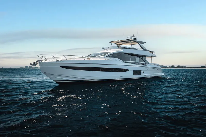 Slide: The Image of 2024 Azimut Fly 78 luxury yacht cruising on open water. - 7
