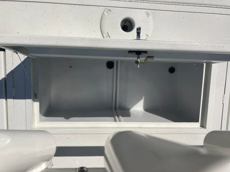 Slide: The Image of 2022 Lowe BAY 20 boat storage compartment. - 13