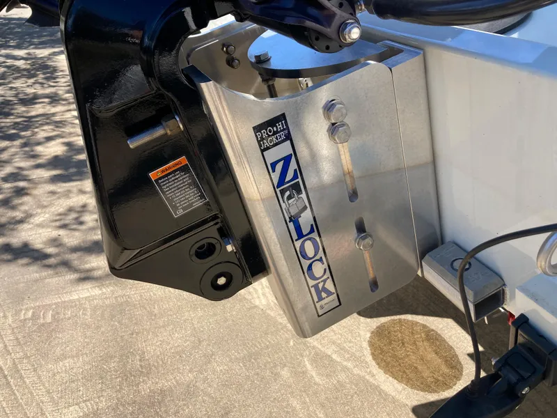 Slide: The Image of Close-up of a 2022 Lowe BAY 20 boat motor mount with Pro Hi Jacker Z-Lock. - 14