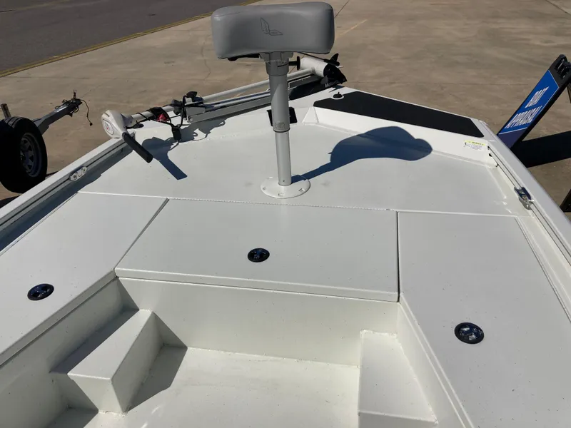 Slide: The Image of 2022 Lowe BAY 20 boat deck with seating and storage compartments. - 6