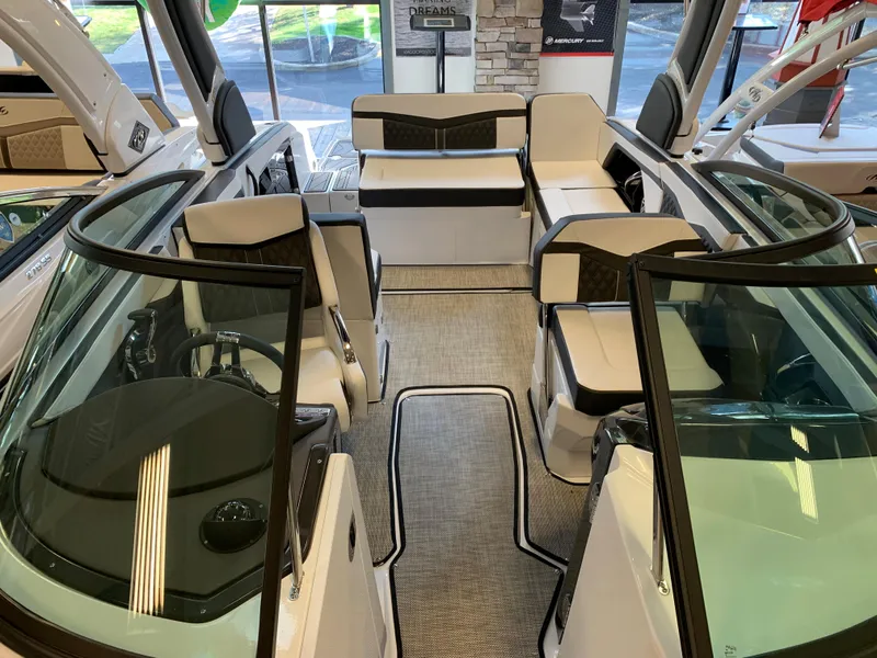 Slide: The Image of 2024 Monterey 258 Super Sport boat interior with luxurious seating and modern design. - 11
