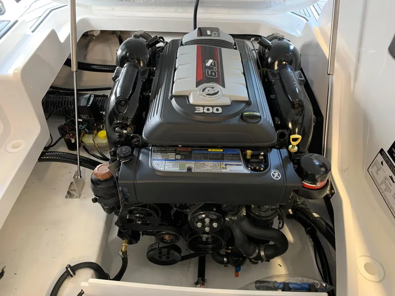 Slide: The Image of 2024 Monterey 258 Super Sport boat engine compartment with 300 HP engine. - 12