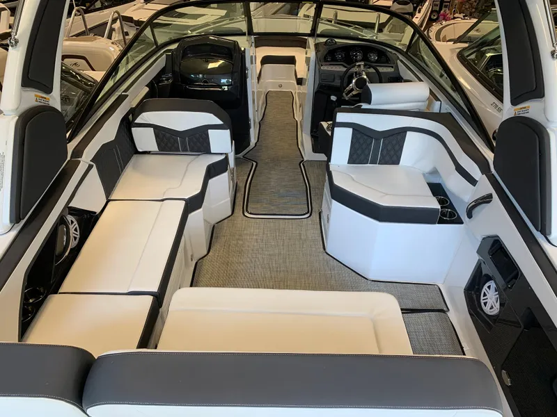 Slide: The Image of 2024 Monterey 258 Super Sport boat interior with luxurious seating and modern design. - 2