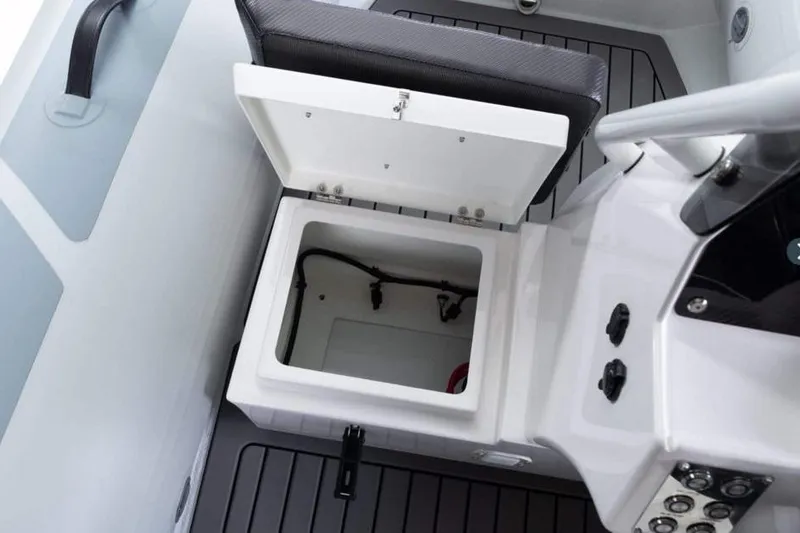 Slide: The Image of Open storage compartment on 2026 Highfield Sport 330 boat, featuring sleek interior design. - 8