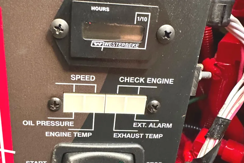 Slide: The Image of Control panel of a 2022 Regal 26XO boat with Westerbeke hour meter. - 43