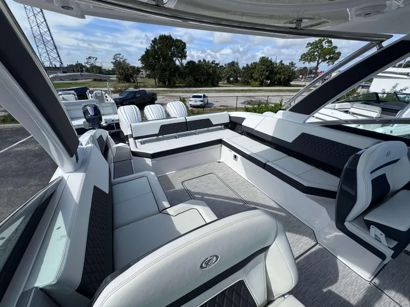 Slide: The Image of Luxurious interior of the 2024 Cobalt R33 boat with spacious seating and modern design. - 18