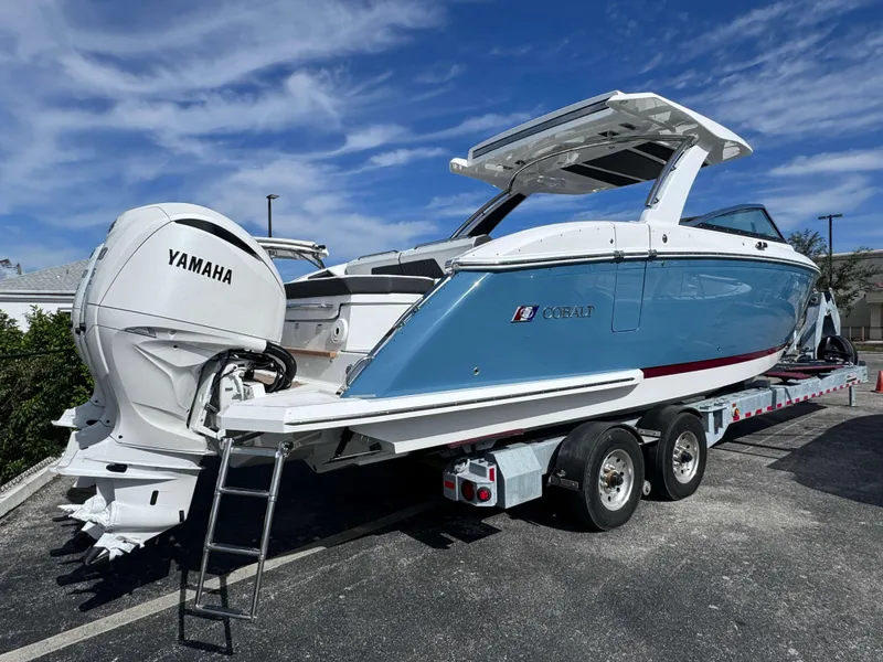 Slide: The Image of 2024 Cobalt R33 boat with Yamaha outboard engine on trailer. - 3