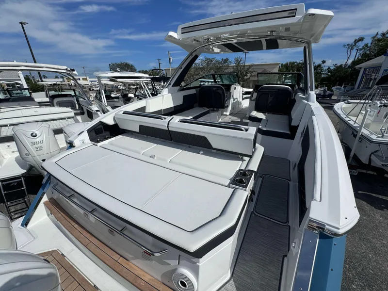 Slide: The Image of 2024 Cobalt R33 luxury boat with spacious seating and modern design. - 4