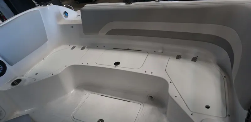 Slide: The Image of Interior seating and storage compartments of the 2024 Hurricane 231 SS boat. - 11