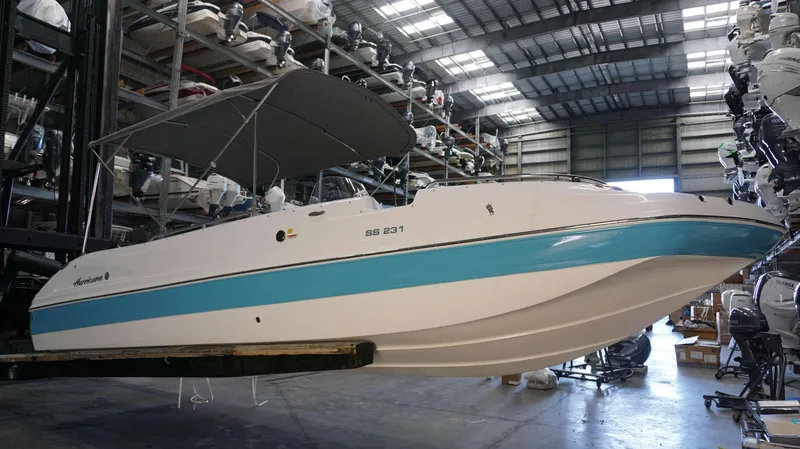 Slide: The Image of 2024 Hurricane 231 SS boat in storage facility. - 16