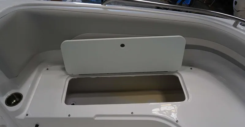 Slide: The Image of 2024 Hurricane 231 SS boat storage compartment with open hatch. - 24