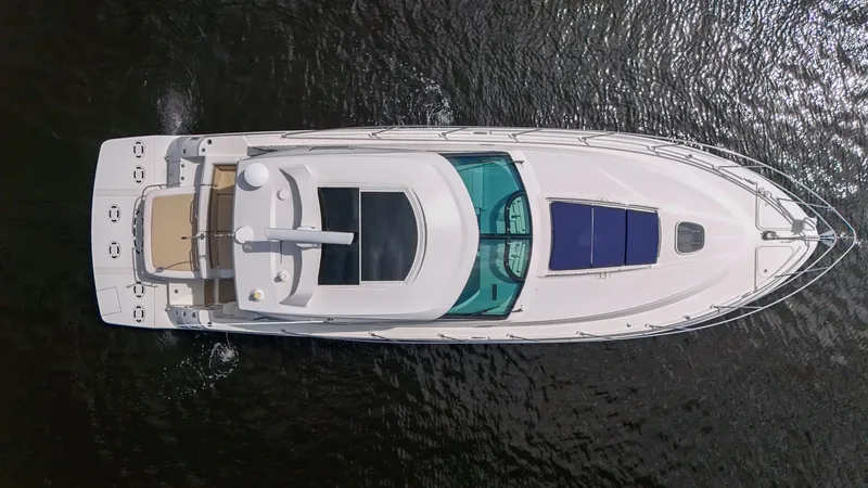 Slide: The Image of Overhead view of 2013 Sea Ray 450 Sundancer yacht on water. - 3