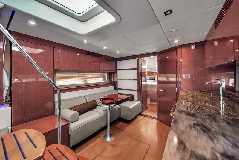 Slide: The Image of Luxurious interior of 2013 Sea Ray 450 Sundancer yacht with modern furnishings and elegant design. - 4