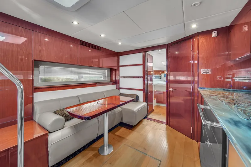 Slide: The Image of Luxurious interior of 2013 Sea Ray 450 Sundancer yacht with elegant wood finishes. - 42