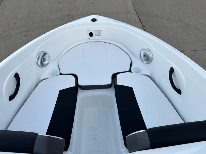 Slide: The Image of 2024 Tahoe 185 S boat interior with white and black seating. - 3