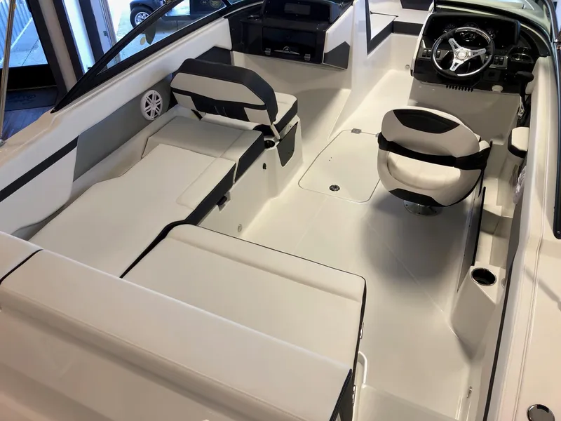 Slide: The Image of 2024 Monterey M-205 boat interior with white and black seating. - 8