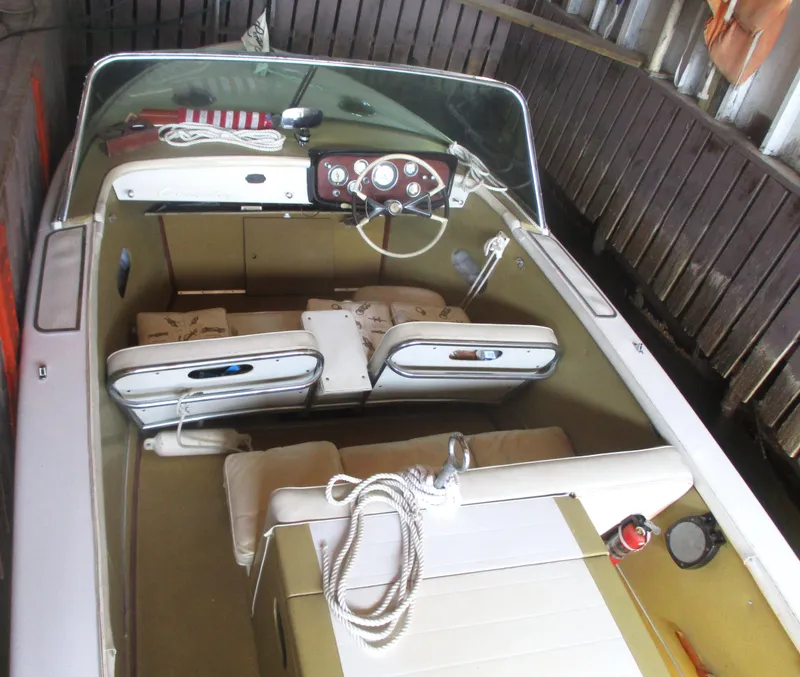 Slide: The Image of 1963 Coronado 21 by Century classic boat interior with vintage dashboard and seating. - 11