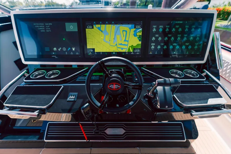 Slide: The Image of Dashboard of 2025 Cigarette 52 Thunder boat with advanced navigation and control systems. - 13