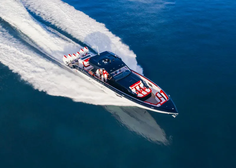 Slide: The Image of 2025 Cigarette 52 Thunder speedboat cruising on open water. - 17