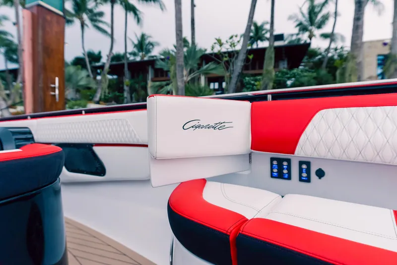 Slide: The Image of Luxury seating on the 2025 Cigarette 52 Thunder boat with red and white upholstery. - 24