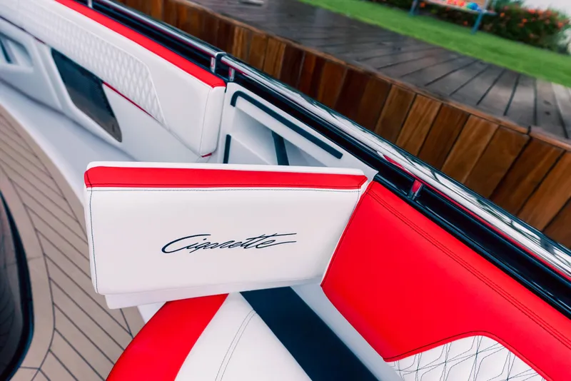 Slide: The Image of Interior of 2025 Cigarette 52 Thunder boat with red and white seating. - 27