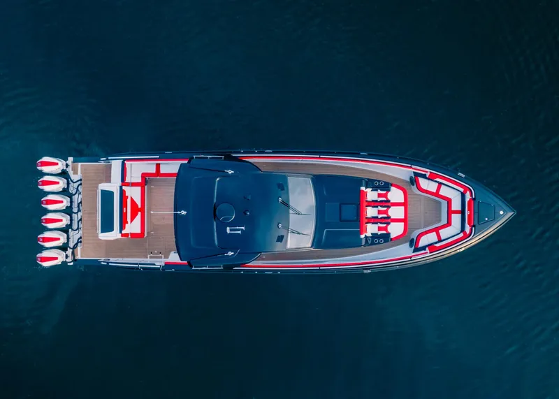 Slide: The Image of Aerial view of 2025 Cigarette 52 Thunder luxury speedboat on water. - 3