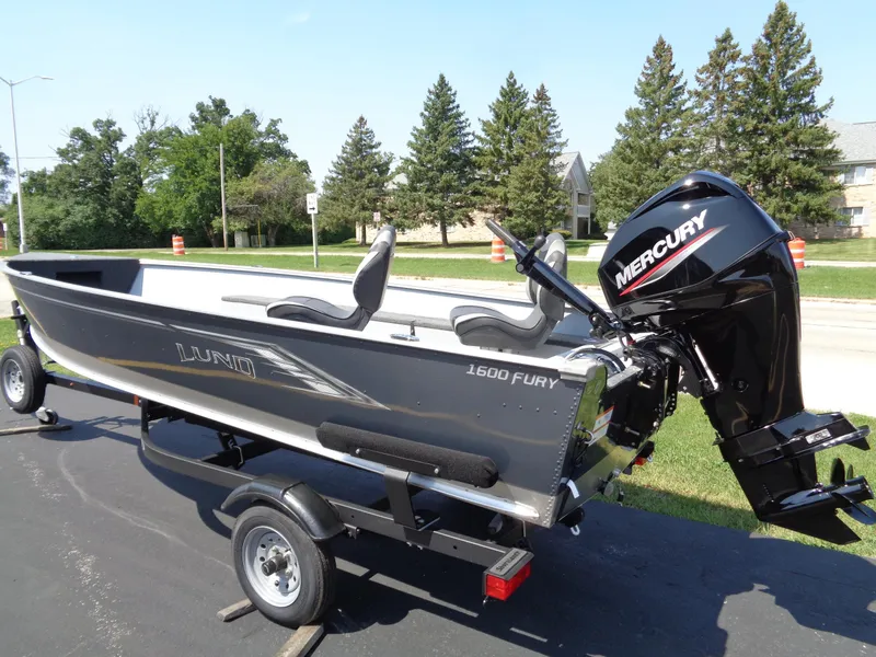 Slide: The Image of 2024 Lund 1600 Fury Tiller boat with Mercury engine on trailer. - 3