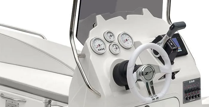 Slide: The Image of 2024 Zar Formenti 49 SL boat dashboard with steering wheel and gauges. - 2