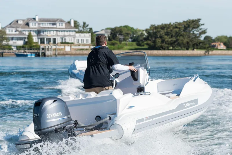 Slide: The Image of 2024 Zar Formenti 49 SL boat cruising on water with Yamaha engine. - 4