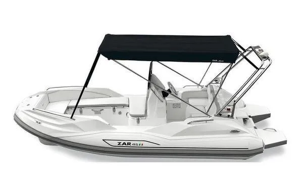 Slide: The Image of 2024 Zar Formenti 49 SL boat with black canopy and white hull. - 6
