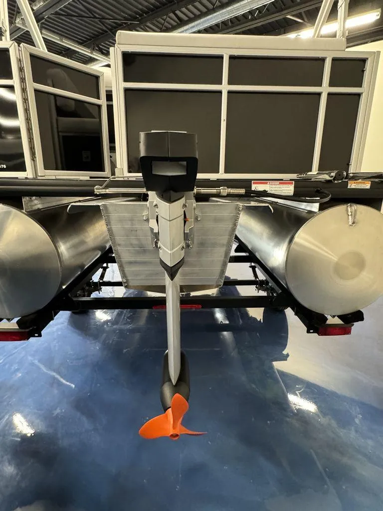 Slide: The Image of 2024 Godfrey MG 1476 F pontoon boat rear view with motor. - 6