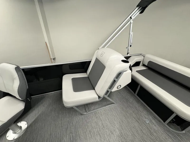 Slide: The Image of Interior seating of 2024 Godfrey MG 1476 F boat with gray and white upholstery. - 8