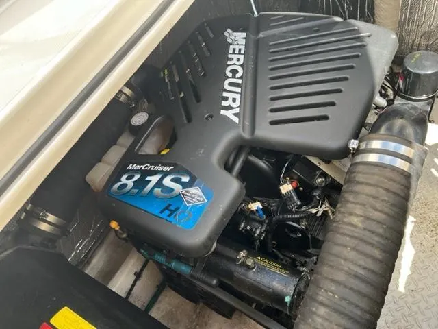 Slide: The Image of 2003 Cruisers Yachts 3772 Express engine compartment with Mercury MerCruiser 8.1S engine. - 24