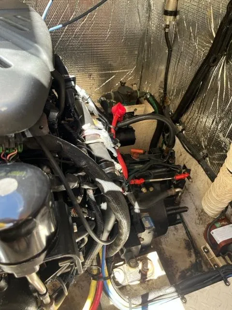 Slide: The Image of Engine compartment of a 2003 Cruisers Yachts 3772 Express boat. - 29