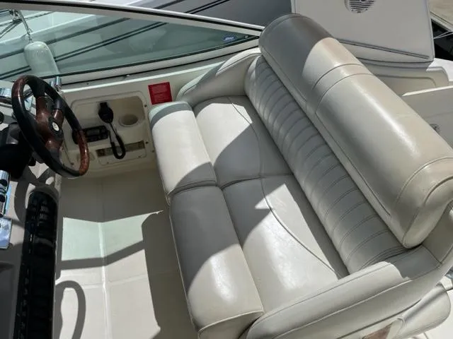 Slide: The Image of 2003 Cruisers Yachts 3772 Express helm seat and dashboard. - 38