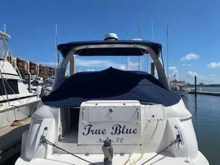 Slide: The Image of 2003 Cruisers Yachts 3772 Express True Blue docked at marina. - 40