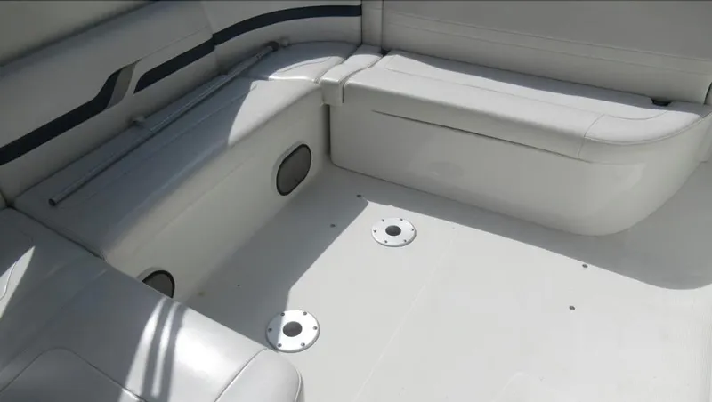 Slide: The Image of Interior seating area of a 2000 Formula 400 SS boat with white upholstery. - 5
