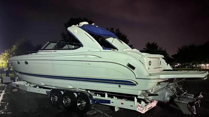 Slide: The Image of 2000 Formula 400 SS boat on a trailer at night. - 7