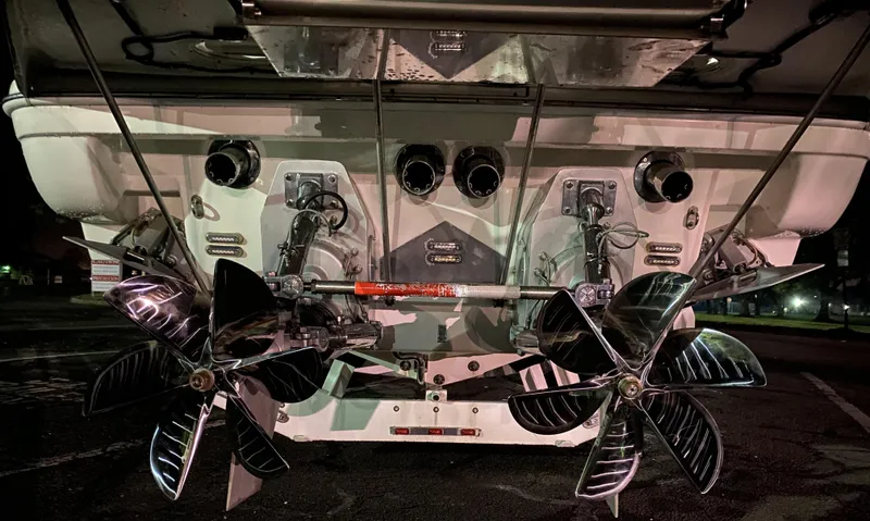 Slide: The Image of Rear view of a 2000 Formula 400 SS boat with dual propellers. - 9