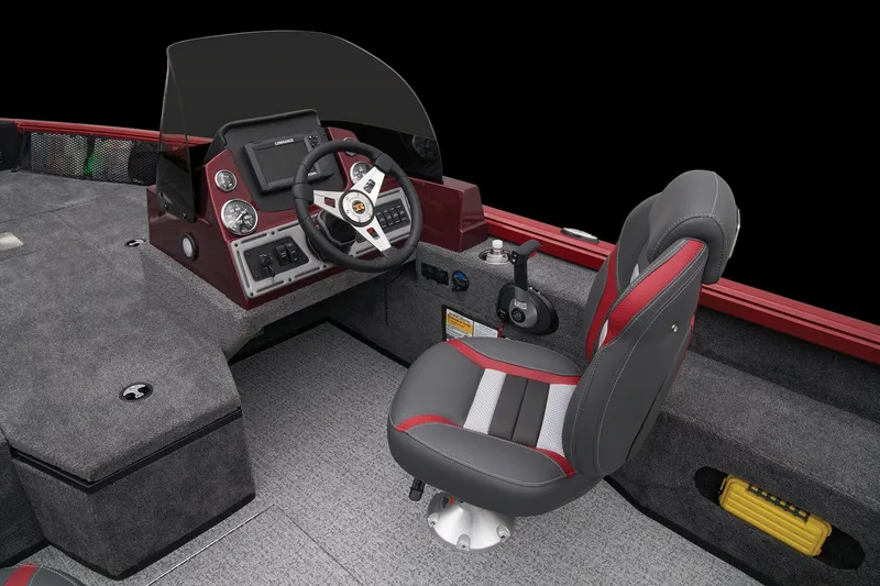 Slide: The Image of 2024 Ranger VS1682SC Angler boat cockpit with steering wheel and captain's chair. - 28