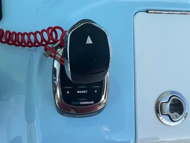 Slide: The Image of Tidewater 320 CC Adventure 2020 boat control panel with throttle and ignition. - 15