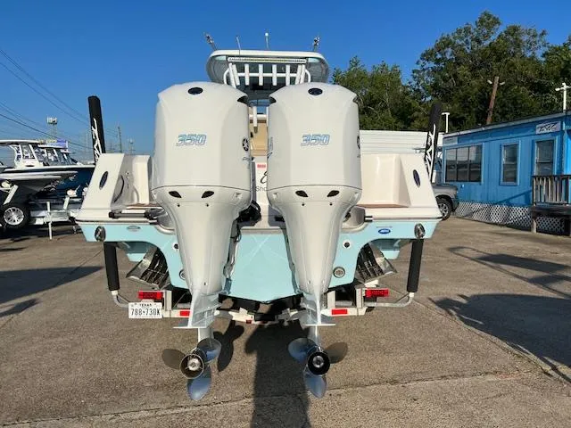 Slide: The Image of 2020 Tidewater 320 CC Adventure boat with twin 350 HP outboard engines. - 2