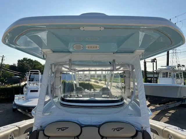 Slide: The Image of 2020 Tidewater 320 CC Adventure boat with hardtop and seating. - 21