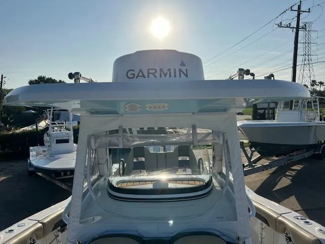 Slide: The Image of 2020 Tidewater 320 CC Adventure boat with Garmin radar in a marina. - 22