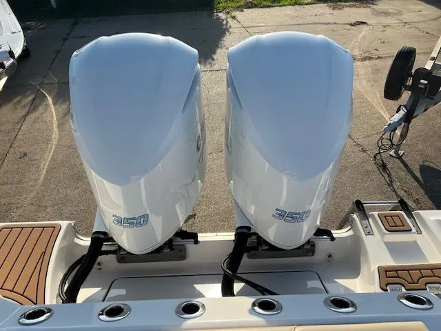 Slide: The Image of Twin 350 HP engines on a 2020 Tidewater 320 CC Adventure boat. - 4