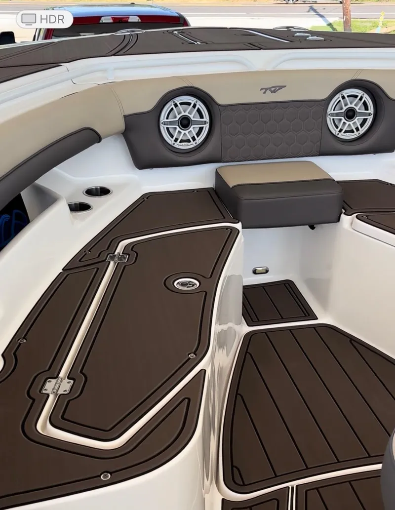 Slide: The Image of 2020 Tidewater 320 CC Adventure boat interior with sleek seating and modern design. - 5