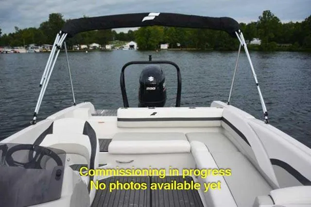 Slide: The Image of 2024 Starcraft SVX 211 OB boat commissioning in progress on a lake. - 9