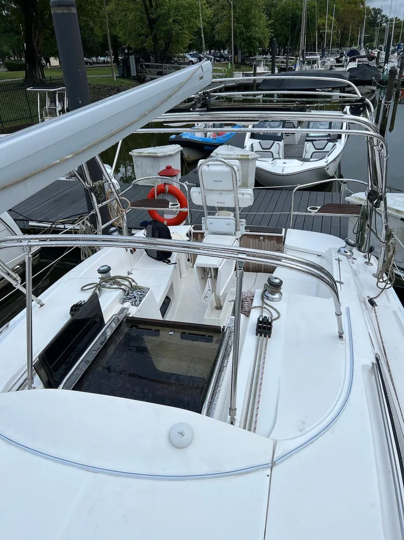 Slide: The Image of 2014 Marlow-Hunter e33 sailboat docked at a marina. - 8