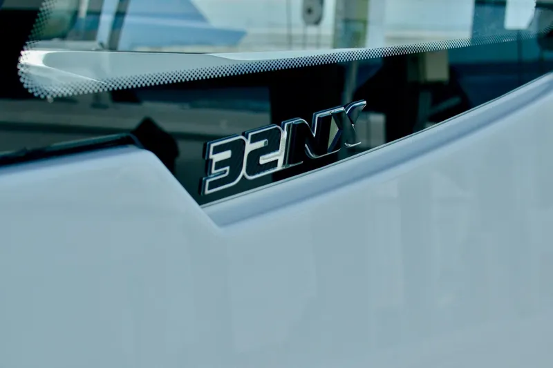 Slide: The Image of 2024 Fountain 32 NX boat model emblem close-up. - 35